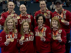 Reigning Olympic gold-medallists Brad Jacobs (back row, left) of Sault Ste. Marie, Ont., and Winnipeg’s Jennifer Jones (front row, left) are returning with their teammates in hopes of defending the Tim Hortons Roar of the Rings titles they won four years ago in Winnipeg.