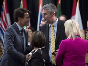 Prime Minister Justin Trudeau shakes hands with Nova Scotia Premier Stephen McNeil before the First Ministers Meeting in Ottawa, Tuesday October 3, 2017.