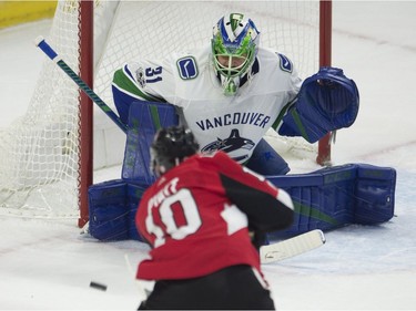 Ottawa Senators left wing Tom Pyatt shoots on Vancouver Canucks goalie Anders Nilsson during first period NHL action Tuesday, October 17, 2017 in Ottawa.