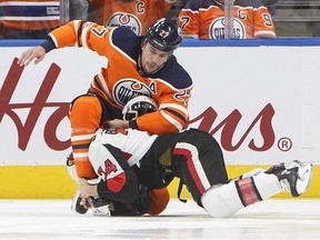 Mark Borowiecki took on the Oilers' Milan Lucic last Saturday in Edmonton. Coach Guy Boucher says Borowiecki often fights with a specific purpose. 'In Edmonton, you've got Lucic, who sends fear everywhere he goes, and after (the fight) our guys looked bigger and tougher,' Boucher said.