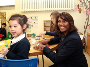 Indira Naidoo-Harris, Ontario's minister of women's issues and child care, visits a Kingston kindergarten in a file photo from 2016.
