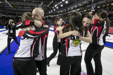 Coach Adam Kingsbury celebrates with Rachel Homan’s Ottawa-based team after winning the 2017 Scotties Tournament of Hearts, the Canadian Women’s Curling Championship in St Catharines, Ont.