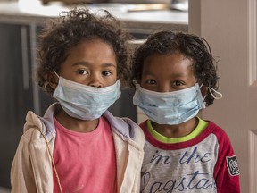 Children wear face masks at a school in Antananarivo, Madagascar, Tuesday, Oct. 3, 2017. Authorities in Madagascar are struggling to contain an outbreak of plague that has killed at least two dozen people, and the government has begun a campaign to disinfect school classrooms in the city. (AP Photo/Alexander JOE) ORG XMIT: XDF102
Alexander JOE, AP