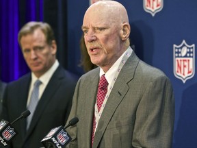 FILE -In this Dec. 10, 2014 file photo Houston Texans owner Bob McNair speaks at an NFL press conference during an owners meeting, in Irving, Texas. At left is NFL commissioner Roger Goodell. McNair has apologized after a report said he declared "we can't have the inmates running the prison" during a meeting of NFL owners over what to do about players who kneel in protest during the national anthem. (AP Photo/Brandon Wade, File)