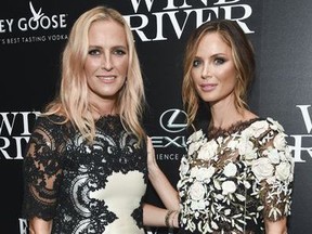 In this Aug. 2, 2017 file photo, fashion designers Keren Craig, left, and Georgina Chapman, co-founders of Marchesa, attend a special screening of "Wind River", in New York. Chapman took what some believed was her only brand-saving leap Tuesday, Oct. 10, 2017, as sex abuse allegations against her husband Harvey Weinstein mounted. Breaking her six-day silence when she told People she was leaving the film mogul she married in 2007. The divorce revelation came as some on social media called for a Marchesa boycott. (Photo by Evan Agostini/Invision/AP, File)