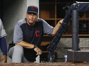 Cleveland Indians manager Terry Francona watches play against the New York Yankees from the dugout in Game 4 of baseball's American League Division Series, Monday, Oct. 9, 2017, in New York. (AP Photo/Kathy Willens)