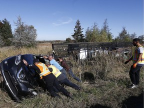 Overturned Truck

A truck carrying four cars on a trailer overturned into a ditch at the Anderson Road exit in Ottawa Ontario Wednesday Oct. 18, 2017. No one was injured in the accident.    Tony Caldwell
Tony Caldwell