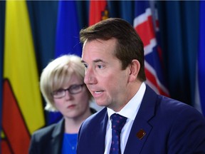 Scott Brison, president of the Treasury Board of Canada, delivers remarks and answer questions from the media regarding an update on the Phoenix pay system on Parliament Hill in Ottawa on Thursday, Oct. 5, 2017.