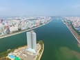 Singaporean photographer Aram Pan recently flew over Pyongyang in a microlight plane, filming video and taking photos.