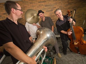 The band Safe Low Limit featuring Keith Hartshorn-Walton on tuba, Michel Delage on drums, Ken Kanwisher on cello and Steve Berndt on trombone performs 'Tuba Tango' in the OC Sessions studio.  Photo Wayne Cuddington/ Postmedia
Wayne Cuddington, Postmedia