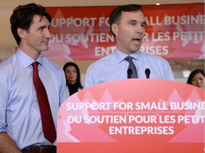 Morneau

Finance Minister Bill Morneau speaks to members of the media as Prime Minister Justin Trudeau looks on at a press conference on tax reforms in Stouffville, Ont., on Monday, October 16, 2017. THE CANADIAN PRESS/Nathan Denette ORG XMIT: NSD519
Nathan Denette,