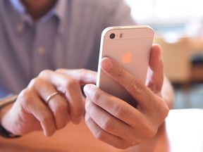 A man using a smartphone.