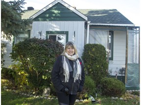 Cheryl Walsh, shown here outside her home on Marshall Avenue, grew up in the Ottawa neighbourhood known as The Vets. When her father died in 2000, Walsh returned to live in the community.