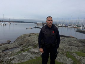 Oak Bay Const. Brett Stewart helped to rescue a man who was clinging to the side of his boat for 25 minutes after falling into the water near Oak Bay Marina on Saturday, Nov. 11, 2017.