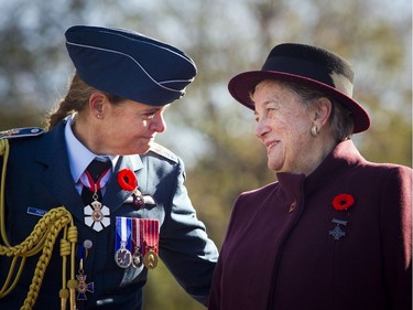 Governor General Julie Payette speaks with 2017 National Silver Cross Mother Diana Abel, right, during the National Remembrance Day Ceremony at the National War Memorial in Ottawa on Saturday, November 11, 2017.