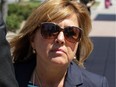 Christy Natsis (left) outside the Elgin St. courthouse in Ottawa, Monday, May 12, 2014. Natsis' drunk driving trial resumed today after a long break.