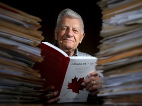 Paul Taillefer, 93, a former photojournalist, decided to celebrate Canada's 150th by writing a 500-page history of Canada in two languages. 150 Years of History.  He poses in the study of his Ottawa home surrounded by just some of his files.