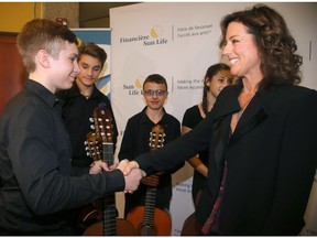 Grammy-winning singer-songwriter Sarah McLachlan helped unveil the Sun Life Financial Musical Instrument Lending Library program at the downtown Ottawa Public Library on Tuesday.