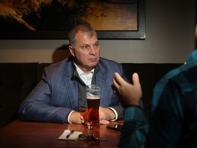 Sports reporter Tim Baines sits down for beer and a Q & A with CFL Commissioner, Randy Ambrosie, at The Keg in Ottawa's Byward Market Tuesday