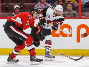 The Senators' Cody Ceci cuts off Tobias Rieder of the Coyotes during a game in Ottawa in October 2016. Francois Laplante/FreestylePhoto/Getty Images