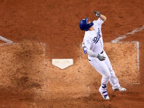 World Series - Houston Astros v Los Angeles Dodgers - Game Six

LOS ANGELES, CA - OCTOBER 31:  Joc Pederson #31 of the Los Angeles Dodgers celebrates after hitting a solo home run during the seventh inning against the Houston Astros in game six of the 2017 World Series at Dodger Stadium on October 31, 2017 in Los Angeles, California.  (Photo by Sean M. Haffey/Getty Images)

No more than 7 images from any single MLB game, workout, activity or event may be used (including online and on apps) while that game, activity or event is in progress.
Sean M. Haffey, Getty Images