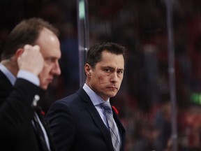 Guy Boucher, right, will have the Ottawa Senators return to practice on Tuesday after two days off since the team's last game, a 2-1 loss to the New York Islanders on Saturday. Nils Petter Nilsson/Ombrello/Getty Images