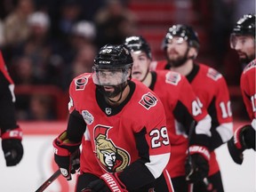 Swedish-born Johnny Oduya celebrates with Senators teammates after scoring a goal to tie Saturday's game 3-3. Nils Petter Nilsson/Ombrello/Getty Images