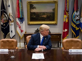 US President Donald Trump (C) makes a statement from the Roosevelt Room next to the empty chairs of Senate Minority Leader Chuck Schumer (L), D-New York, and House Minority Leader Nancy Pelosi (R), D-California, after they cancelled their meeting at the White House in Washington, DC, on November 28, 2017. / AFP PHOTO / JIM WATSON        (Photo credit should read JIM WATSON/AFP/Getty Images) *** BESTPIX ***

BESTPIX
AFP Contributor#AFP