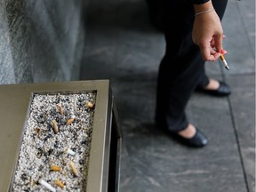 FILES-US-HEALTH-TOBACCO-RESEARCH

(FILES) This file photo taken on August 01, 2017 shows a woman smoking a cigarette in the Lujiazui Financial District in Pudong in Shanghai.  Smokers who are offered cash incentives are far more likely to give up cigarettes than those who are simply offered tips on how to quit, said a US study on October 30, 2017. The approach could offer ways to cut the number of smokers, which has remained steady at about one-fifth of the US population in recent years, according to the report in the Journal of the American Medical Association (JAMA) Internal Medicine.  / AFP PHOTO / Chandan KHANNACHANDAN KHANNA/AFP/Getty Images
CHANDAN KHANNA, AFP/Getty Images