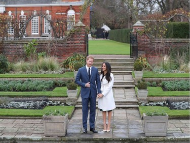 BRITAIN-ROYALS-MARRIAGE

Britain's Prince Harry and his fiancée US actress Meghan Markle pose for a photograph in the Sunken Garden at Kensington Palace in west London on November 27, 2017, following the announcement of their engagement. Britain's Prince Harry will marry his US actress girlfriend Meghan Markle early next year after the couple became engaged earlier this month, Clarence House announced on Monday. / AFP PHOTO / Daniel LEAL-OLIVASDANIEL LEAL-OLIVAS/AFP/Getty Images
DANIEL LEAL-OLIVAS, AFP/Getty Images