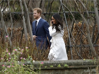 Britain's Prince Harry and his fiancee Meghan Markle arrive for a photocall in the grounds of Kensington Palace in London, Monday Nov. 27, 2017. Britain's royal palace says Prince Harry and actress Meghan Markle are engaged and will marry in the spring of 2018. (AP Photo/Matt Dunham) ORG XMIT: TH125
Matt Dunham, AP