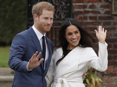 Britain's Prince Harry and his fiancee Meghan Markle pose for photographers during a photocall in the grounds of Kensington Palace in London, Monday Nov. 27, 2017. Britain's royal palace says Prince Harry and actress Meghan Markle are engaged and will marry in the spring of 2018. (AP Photo/Matt Dunham) ORG XMIT: TH112
Matt Dunham, AP