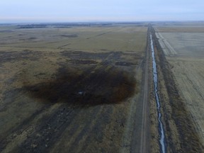 This aerial photo shows spills from TransCanada Corp.'s Keystone pipeline, Friday, Nov. 17, 2017, that leaked an estimated 210,000 gallons of oil onto agricultural land in northeastern South Dakota, near Amherst, S.D., the company and state regulators said Thursday, but state officials don't believe the leak polluted any surface water bodies or drinking water systems. Crews shut down the pipeline Thursday morning and activated emergency response procedures after a drop in pressure was detected resulting from the leak south of a pump station in Marshall County, TransCanada said in a statement. The cause was being investigated. (DroneBase via AP)