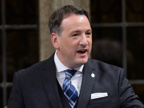 Greg Rickford answers a question in Parliament as minister of natural resources in 2014.