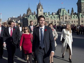 Prime Minister Justin Trudeau and his newly sworn-in cabinet ministers arrive on Parliament Hill l in Ottawa on Wednesday, Nov. 4, 2015.