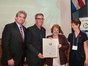 Left to right: John Fraser, MPP Ottawa South and parliamentary assistant to the minister of health and long-term care; Jim Watson, mayor of Ottawa; Paddy Bowen, CEO of The Dementia Society; Lynda Colley, chair of board of directors, The Dementia Society.