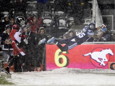 Toronto Argonauts wide receiver DeVier Posey (85) dives into the end zone for a touchdown during first half CFL football action against the Calgary Stampeders in the 105th Grey Cup on Sunday November 26, 2017 in Ottawa.