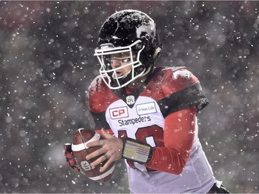 Calgary Stampeders quarterback Bo Levi Mitchell handles the ball during first half CFL football action against the Toronto Argonauts in the 105th Grey Cup on Sunday November 26, 2017 in Ottawa.