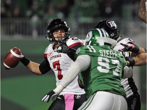 Redblacks quarterback Trevor Harris (7) spots a receiver during second-half action against the Roughriders in a game at Regina on Oct. 13. THE CANADIAN PRESS/Mark Taylor