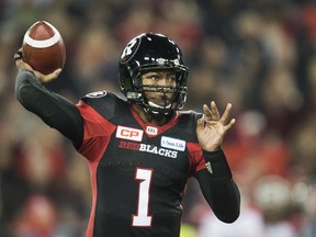 Ottawa Redblacks quarterback Henry Burris passes against the Calgary Stampeders during second quarter CFL Grey Cup action Sunday, November 27, 2016 in Toronto.