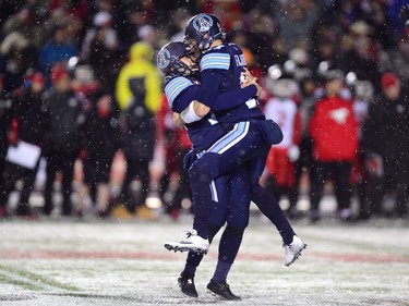 Toronto Argonauts kicker Lirim Hajrullahu (70) celebrates his field goal with backup quarterback Cody Fajardo (17) during second half CFL football action in the 105th Grey Cup on Sunday, November 26, 2017 in Ottawa.