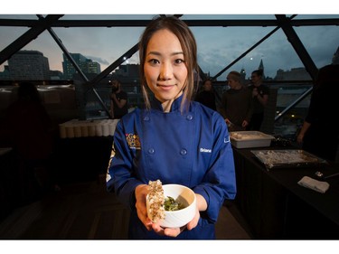 Chef Brianna Kim from Cafe My House prepared a bowl of ginger marinated steak and smoked mushroom, as the annual Gold Medal Plates, which challenged ten different area chefs to prepare a winning recipe, took place at the Shaw Centre.  Photo Wayne Cuddington/ Postmedia
Wayne Cuddington, Postmedia