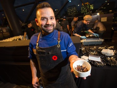 Chef Kyle Mortimer- Proulx of la Maison Conroy prepares a dish of Elk Ranch Osso Bucco with Fermented Blueberry Demiglace as the annual Gold Medal Plates, which challenged ten different area chefs to prepare a winning recipe, took place at the Shaw Centre.  Photo Wayne Cuddington/ Postmedia
Wayne Cuddington, Postmedia