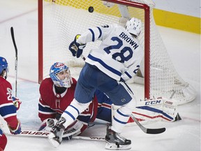 The Maple Leafs' Connor Brown scores against Canadiens goaltender Charlie Lindgren in the third period of Saturday's game. THE CANADIAN PRESS/Graham Hughes