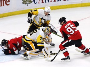 With new linemate Bobby Ryan crashing the crease, Senators centre Matt Duchene has his shot stopped by Penguins goalie Matt Murray during the game at Canadian Tire Centre on Thursday.