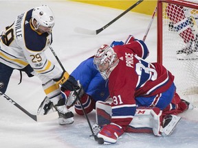 Buffalo Sabres' Jason Pominville moves in on Montreal Canadiens goaltender Carey Price during first period NHL hockey action in Montreal, Saturday, November 25, 2017.