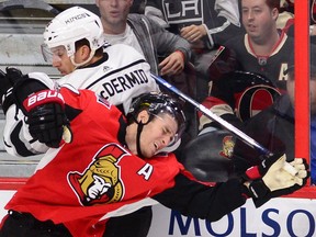 Former Senators centre Kyle Turris collides with the Kings’ Kurtis MacDermid. Turris was traded to the Predators on Sunday night. CANADIAN PRESS/Sean Kilpatrick POS1710242055432372