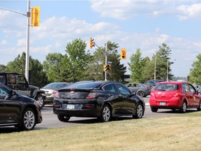 Traffic moves slowly along the Sir John A. Macdonald Parkway, in this 2016 file shot. (Photo by Jean Levac)