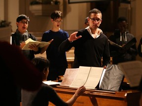 Jamie Loback, Conductor of the Ottawa Children's Chamber Choir is seen rehearsing the choir that will perform with Thirteen Strings on Tuesday, Dec. 5.