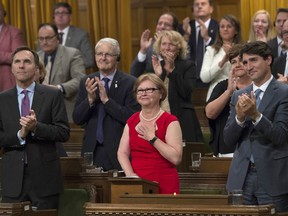 Members of Parliament stand to applaud as Liberal MP Judy Foote recognizes her family in the House of Commons, Thursday, September 28, 2017 in Ottawa.